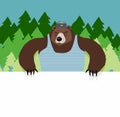 Bear sitting at a table. Royalty Free Stock Photo