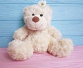 Bear toy flower present softness greeting plush birthday wooden background decoration Royalty Free Stock Photo