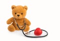 Bear toy and stethoscope. pediatrics medical concept isolated white