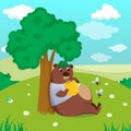 Bear under the tree with bee hive and eats honey on nature background