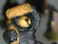 Bear wearing a hat figurine collection