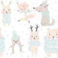 Bear, wolf, reindeer, hare, fox, penguin baby winter seamless pattern. Cute animal Christmas background. Royalty Free Stock Photo