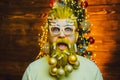 Beard with bauble. Santa in barbershop. Christmas style for modern Santa.