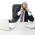 Beard business man on desk with cell phone Royalty Free Stock Photo