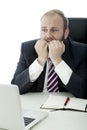 Beard business man fear behind laptop at desk