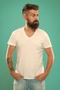 Beard fashion and barber concept. Man bearded hipster stylish beard turquoise background. Barber tips maintain beard