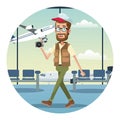 beard man traveler camera cap airport Royalty Free Stock Photo