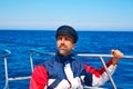 Beard sailor cap man sailing sea ocean in a boat Royalty Free Stock Photo