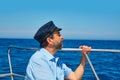 Beard sailor cap man sailing sea ocean in a boat Royalty Free Stock Photo