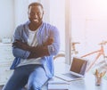 Beard Young Afro-american Man Sitting on Table. Royalty Free Stock Photo