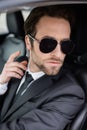 bearded bodyguard in sunglasses and suit Royalty Free Stock Photo