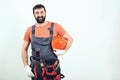 Bearded builder man. House renovation service. Construction worker with tools. Professional builder with tools. Handyman with a Royalty Free Stock Photo