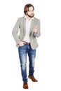 bearded business man with suspicious emotion. human emotion expression and lifestyle concept. image on a white studio background.