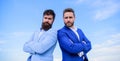 Bearded business people posing confidently. Business men stand blue sky background. Perfect in every detail. Well Royalty Free Stock Photo