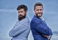 Bearded business people posing confidently. Perfect in every detail. Business men stand blue sky background. Well Royalty Free Stock Photo