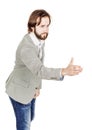 Bearded businessman giving hand for an handshake. human emotion