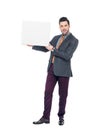 bearded businessman in suit holding blank placard, Royalty Free Stock Photo