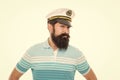 Bearded captain looking askance. Bearded man portrait. Bearded man wearing sailor cap