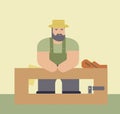 Bearded carpenter in workshop with tools. Craftsman in apron sitting at workbench. Professional woodworker vector