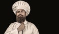 Bearded chef, cooks or baker. Bearded male chefs. Cook hat. Confident bearded male chef in white uniform. Serious cook Royalty Free Stock Photo