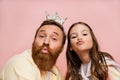 Bearded dad with crown headband pouting Royalty Free Stock Photo