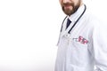 Bearded Doctor in Smock With Various Pills and Tablets in Pocket