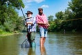 Bearded elegant men. Fisher fishing equipment. Fishing is fun. Man relaxing and fishing by lakeside. Pothunter. Fly fish