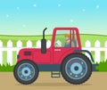 Bearded farmer riding at tractor, agricultural meadow works, rural landscape with working farmer Royalty Free Stock Photo