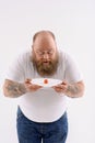 Bearded fat guy shocked of his diet Royalty Free Stock Photo