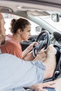 bearded father pointing at speedometer while