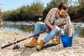 Bearded fisherman prepares fishing gear Royalty Free Stock Photo