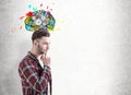 Bearded guy with a copybook and pen, gear brain Royalty Free Stock Photo