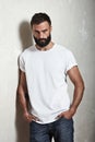 Bearded guy wearing white t-shirt