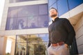 Bearded handsome young business man at office building outdoors Royalty Free Stock Photo