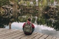 Bearded hiker backpack alone lake stony canyon Royalty Free Stock Photo