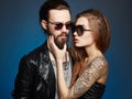 Bearded Hipster boy and beauty girl in glasses