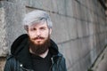 Bearded hipster with nose ring in leather jacket Royalty Free Stock Photo