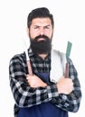 Bearded hipster wear apron for barbecue. Roasting and grilling food. Man hold cooking utensils barbecue. Tools for Royalty Free Stock Photo