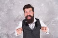 Bearded jewish man. Guy mature bearded stylish dressed in shirt and vest. Jewish holiday. Cheerful and cunning. Charming