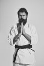 Bearded karate man, brutal caucasian serious hipster in kimono Royalty Free Stock Photo