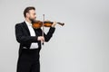 Bearded man artistic violinist performing Royalty Free Stock Photo