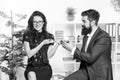 Bearded man and attractive woman. Man and woman conversation coffee time. Office rumors. Office coffee. Couple coworkers Royalty Free Stock Photo