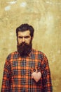 Bearded man with beard with rosy textile heart on shirt Royalty Free Stock Photo