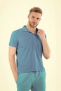 Bearded man in blue casual clothes on white. Man in tshirt and shorts isolated on white. Macho in active wear