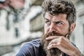 Bearded man concentrated face. Thoughtful mood concept. Making important choices. Man with beard and mustache thoughtful Royalty Free Stock Photo