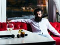 Bearded man on couch