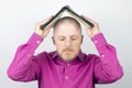 Bearded man covers his head with an open Bible Royalty Free Stock Photo