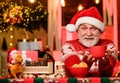 Bearded man eat cookies. winter holiday mood. santa have dinner. for santa. grandpa drink milk. christmas composition