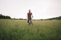 Bearded man enjoy cycling in nature