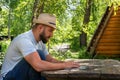 Bearded man freelancer work online on laptop. Bearded man using laptop for freelance work online outdoor